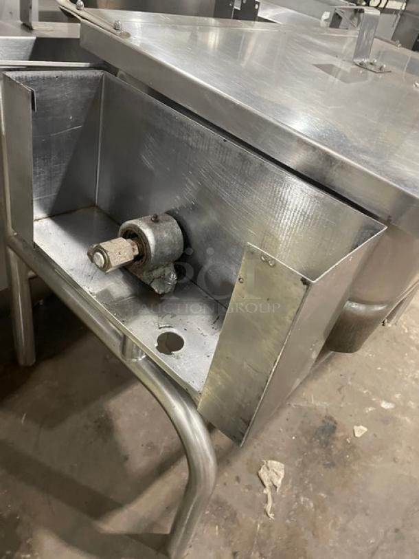 Groen commercial stainless steel natural gas tilt skillet on legs, showing control mechanics, in good condition.