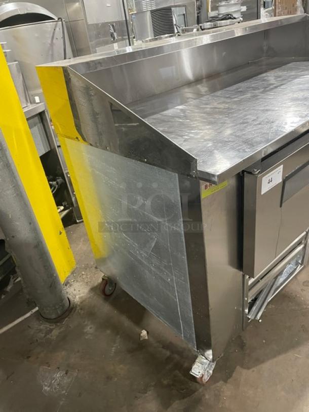 CoolTech 2022 stainless steel 2-door refrigerated pizza prep table, Model CTR-60DR, on casters, 115V 1 Phase.