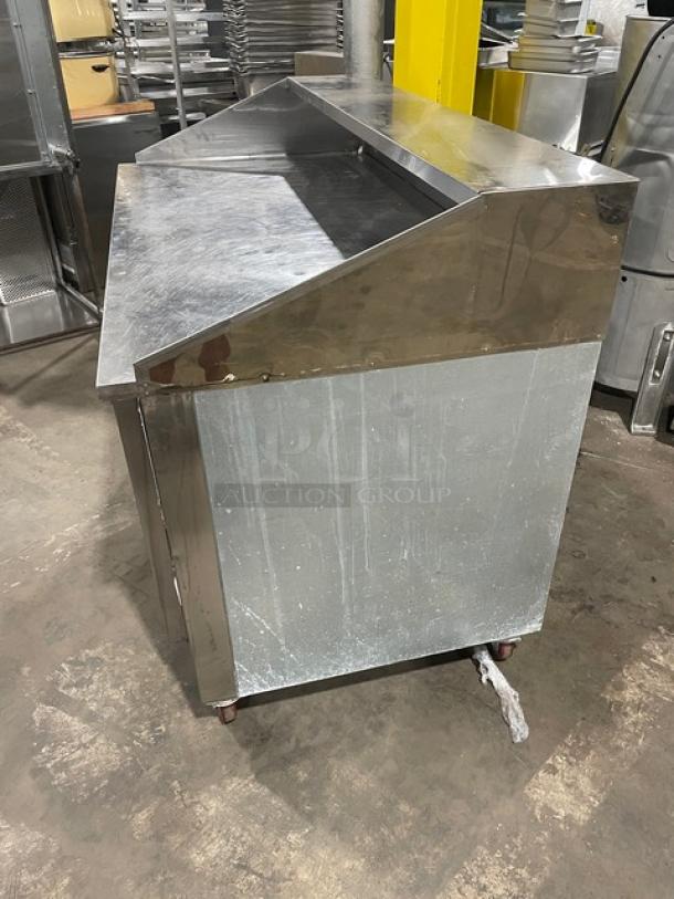 CoolTech 2022 stainless steel two-door refrigerated pizza prep table, model CTR60DR, on casters, for commercial use.