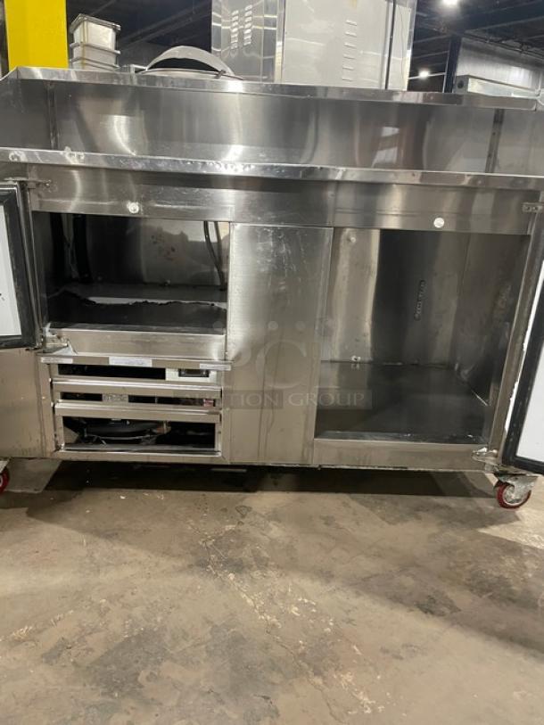 CoolTech 2022 stainless steel 2-door refrigerated pizza prep table, model CTR-60DR, 115V, on casters, open doors.