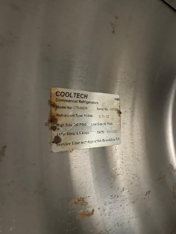 CoolTech CTR-60DR stainless steel refrigerated pizza prep table, shows model and serial number plate.