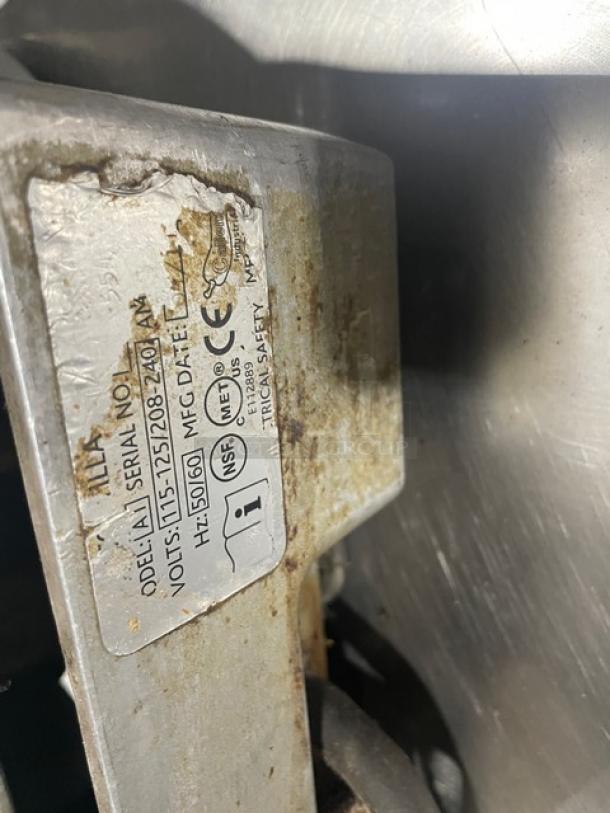 Caliente Industries A1 stainless steel electric tortilla press cooker/warmer, 115-125/208-240V, model label visible.