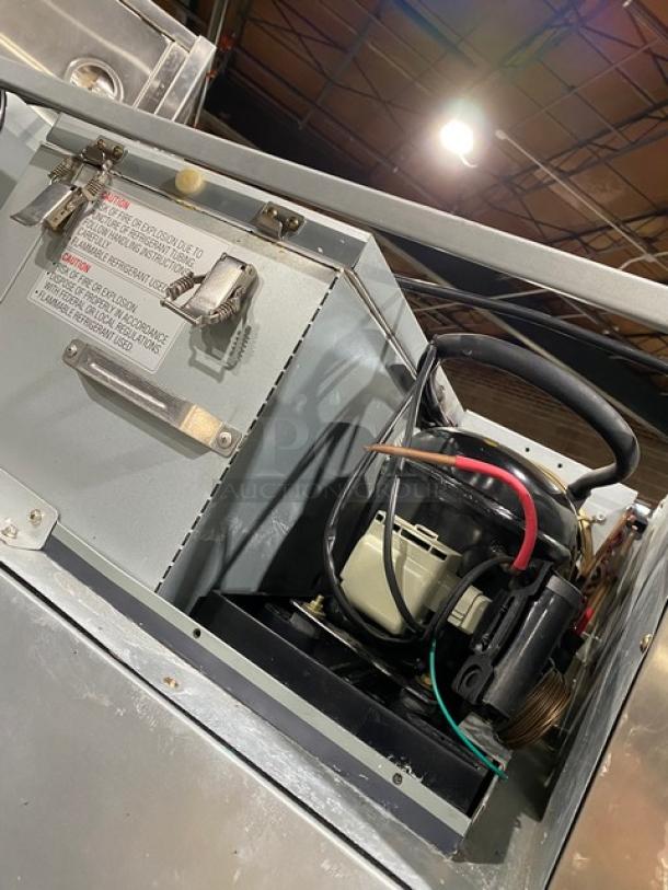 Everest ESF1 stainless steel single door freezer, poly coated wire rack, model ESF1, SN: BSF123040077, 115V, 1 phase.