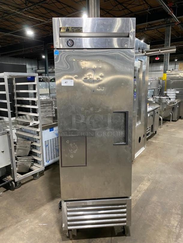 True T-23F commercial stainless steel single door reach-in freezer, Energy Star certified, with poly-coated wire rack, on casters.