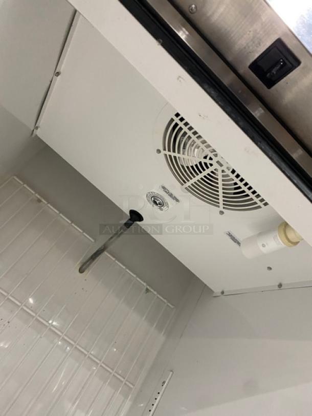 True Commercial Stainless Steel Single Door Reach-In Freezer, Energy Star, Model T-23F, with poly coated wire rack, on casters.