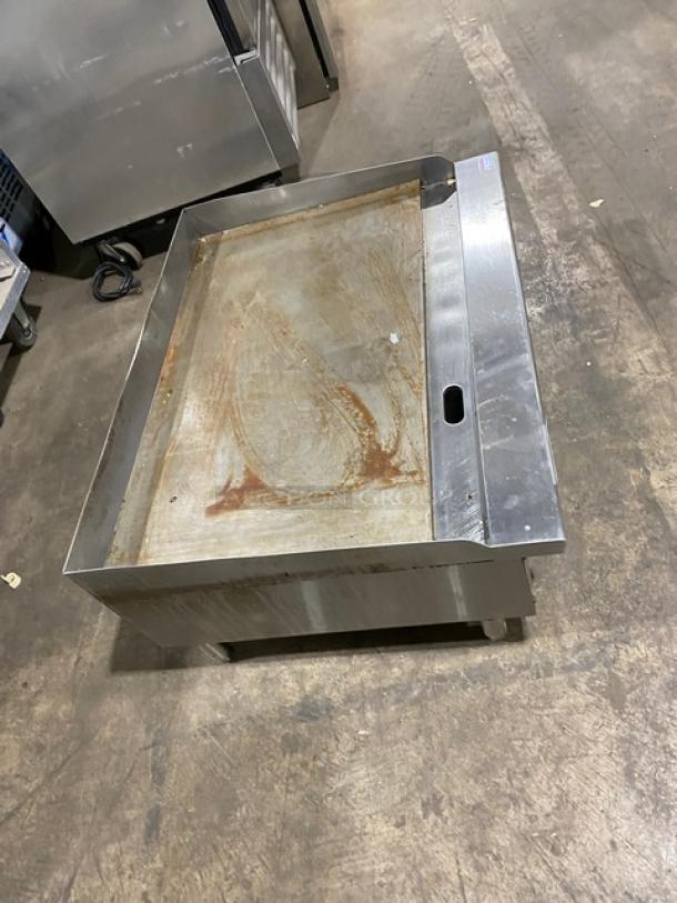 Cook Rite stainless steel natural gas countertop flat griddle with back and side splash, on legs. Used condition.