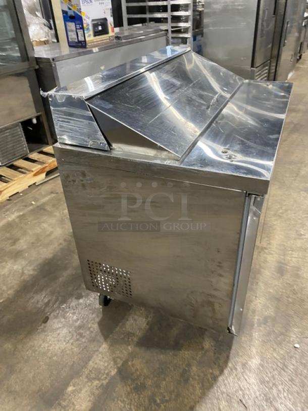 Commercial stainless steel refrigerated prep table, Model SCL2E, with 2 doors, bain marie style, poly-coated wire rack, on casters.