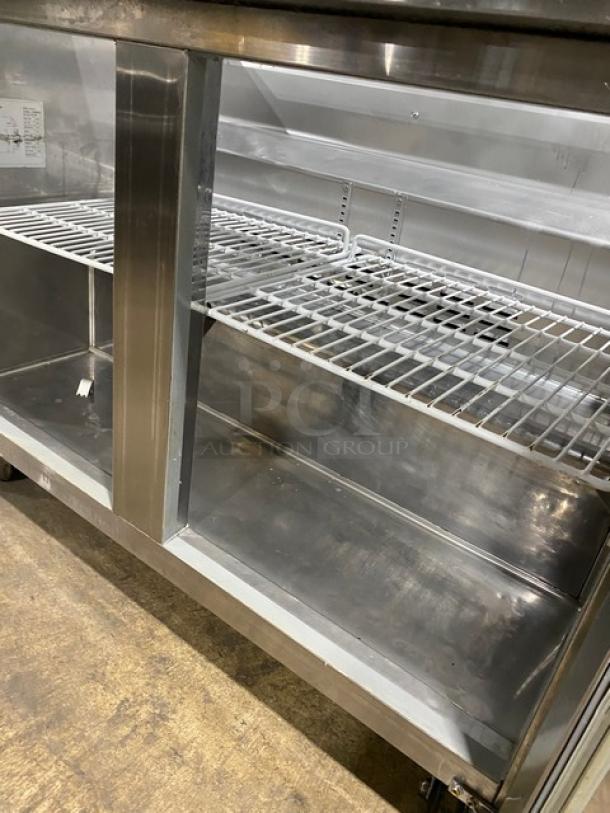 Commercial stainless steel 2-door refrigerated prep table, model SCL2E, with poly coated wire rack, on casters, 115V.