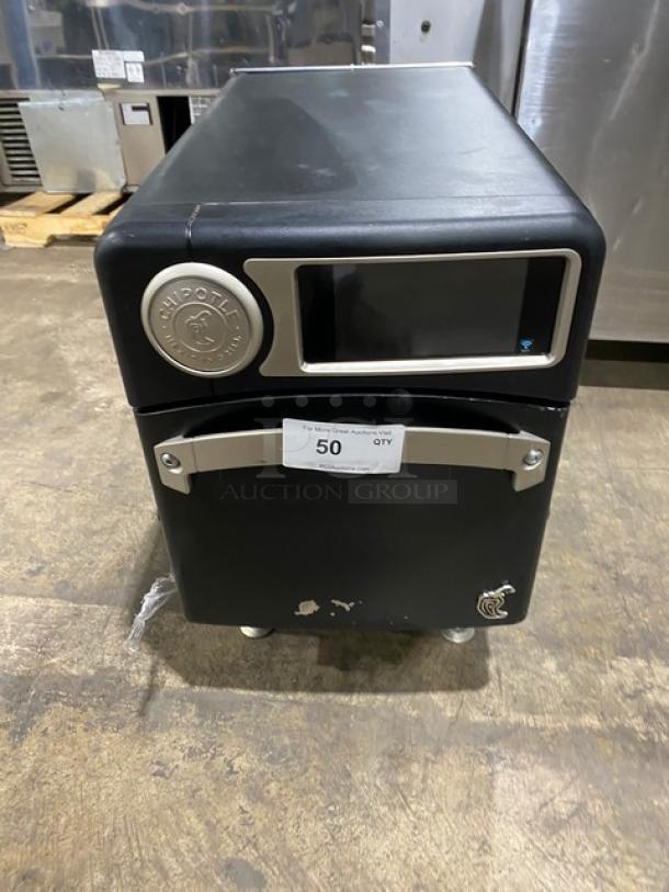 TurboChef NGO countertop ventless rapid cook oven, black, Chipotle style, 2022 model with crank bar, on legs, visible wear.