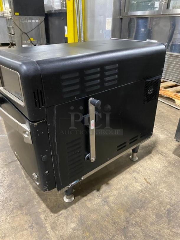 TurboChef Model NGO ventless rapid cook oven, black, countertop, electric, with crank bar, on legs, used condition.