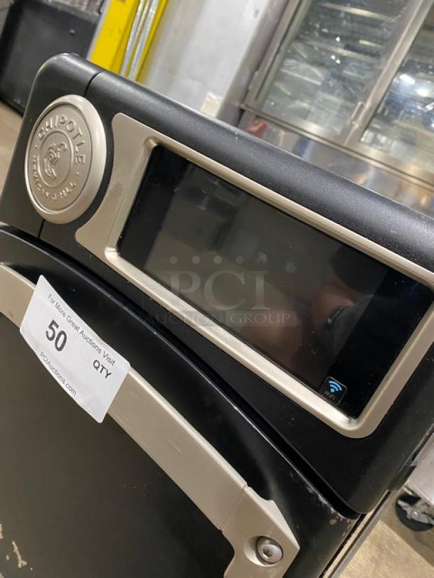TurboChef NGO 2022 ventless rapid cook oven, Chipotle style, electric, black, countertop, with crank bar, on legs.