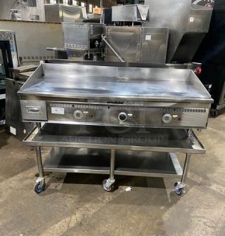 Keating Miraclean Series stainless steel griddle with thermostatic controls, back and side splash, undershelf stand, model 60X30, on casters.