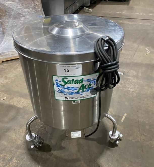 Delfield SALD-1 stainless steel 20-gallon salad dryer on casters, electric-powered, with visible Salad Ace branding.