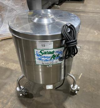 Delfield SALD-1 stainless steel 20-gallon salad dryer on casters, electric-powered, with visible Salad Ace branding.