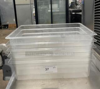 Lot of commercial clear polycarbonate food pans, used condition, stackable design, auction tag indicates quantity: 37.