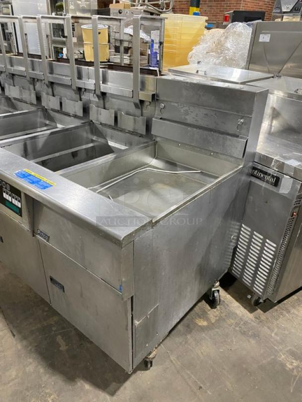 Pitco Frialator SG18JS commercial 4-bay fryer system, stainless steel, natural gas, digital controls, on casters, right-side dump station, filter pan, basket hangers, model SG18-JS, SN: G07AA045019, 120V 1 phase.