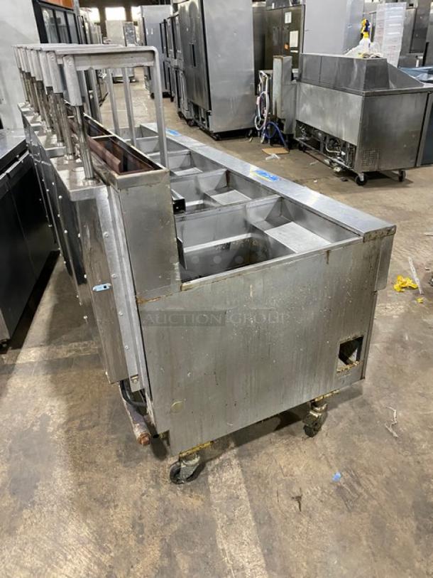 Pitco Frialator SG18-JS commercial stainless steel 4-bay fryer with right-side dump, filter pan, digital controls, on casters.