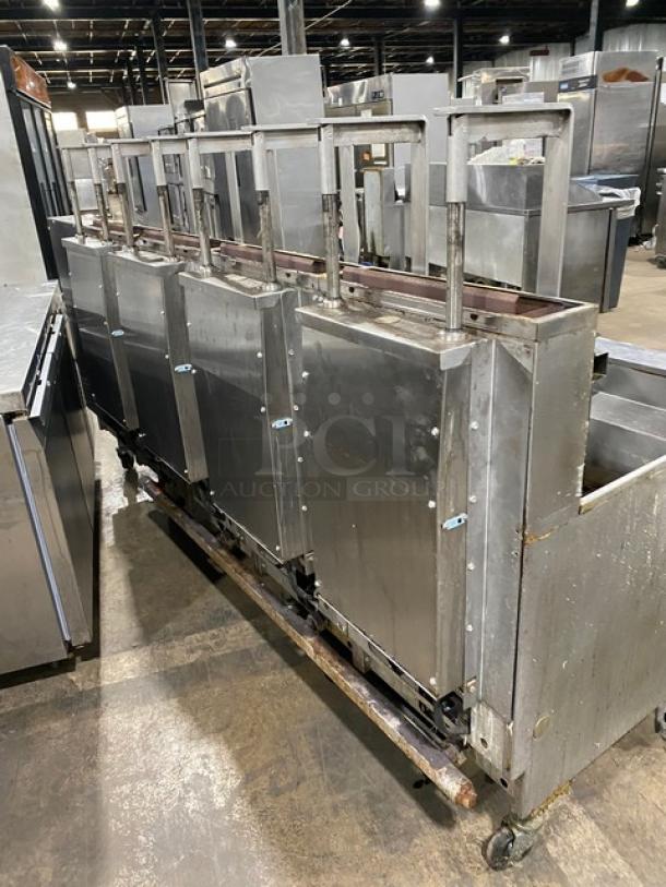 Pitco Frialator SG18JS 4-bay stainless steel deep fat fryer with digital controls, filter pan, dump station, and basket hangers.