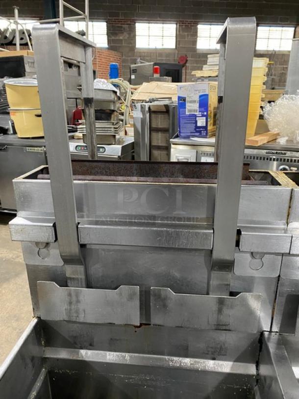Pitco Frialator SG18-JS commercial stainless steel 4-bay deep fryer with digital controls, dump station, filter pan, and basket hangers.