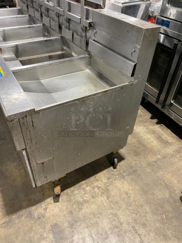 Pitco Frialator SG18JS commercial 4-bay fryer system, stainless steel, natural gas, digital controls, with casters.