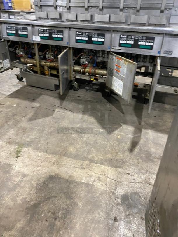 Pitco Frialator SG18-JS commercial stainless steel 4-bay deep fat fryer system with digital controls, filter pan, and basket hangers.