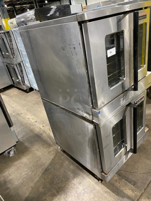 Garland Master Series stainless steel double-stacked convection oven with thermostatic controls and wired racks on casters.