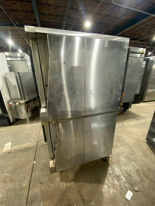 Garland Master Series stainless steel double-stacked convection oven, natural gas, thermostatic controls, wired racks, on casters.