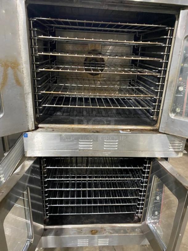 Garland Master Series dual convection oven, stainless steel, natural gas, thermostatic controls, wired racks, on casters.