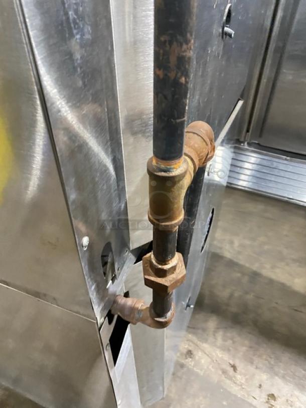 Garland Master Series stainless steel convection oven, natural gas, thermostatic controls, on casters, visible gas connection.