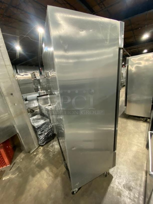 True T-49 commercial refrigerator, stainless steel, Energy Star certified, two solid doors, on casters, serial no. 8658149.