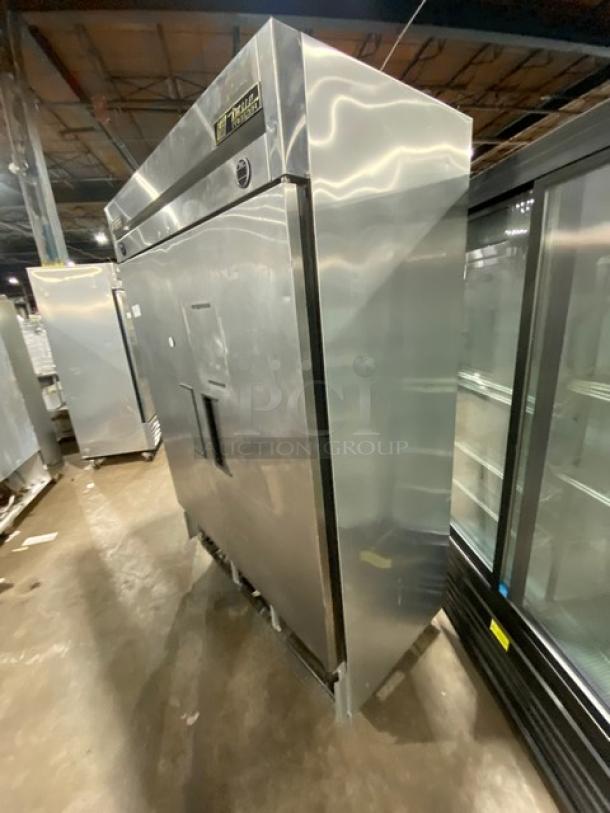 True commercial stainless steel 2-door reach-in refrigerator/freezer combo, model T-49DT, with poly-coated wire racks and casters.