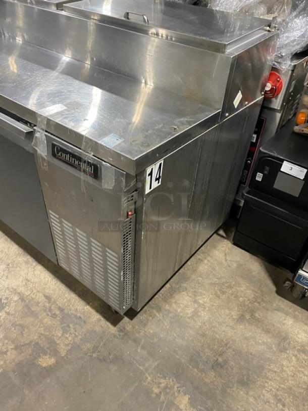 Continental stainless steel pizza prep table, model CPT67-SS, with backsplash, dual doors, poly-coated wire racks, and casters.