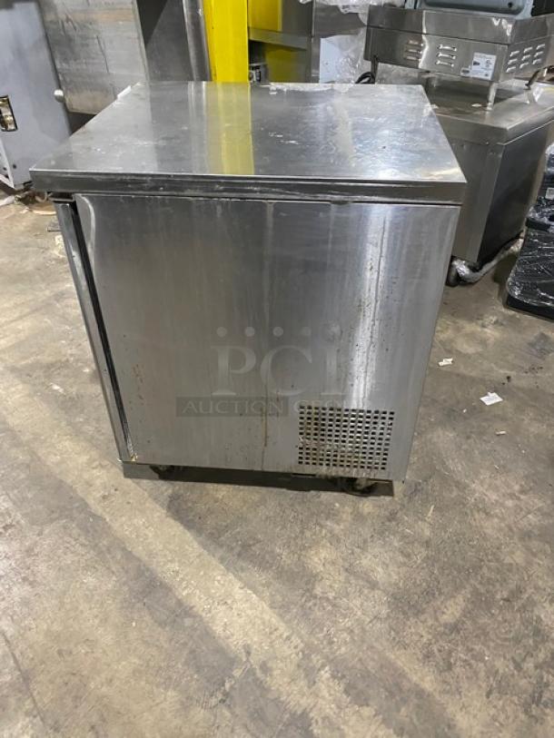 Turbo Air M3 Series MUF-28 stainless steel single door undercounter worktop freezer on casters, showing some wear.
