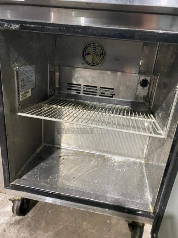 Turbo Air M3 Series undercounter freezer, model MUF-28. Stainless steel, single door, on casters. Interior shelving visible. 115V.