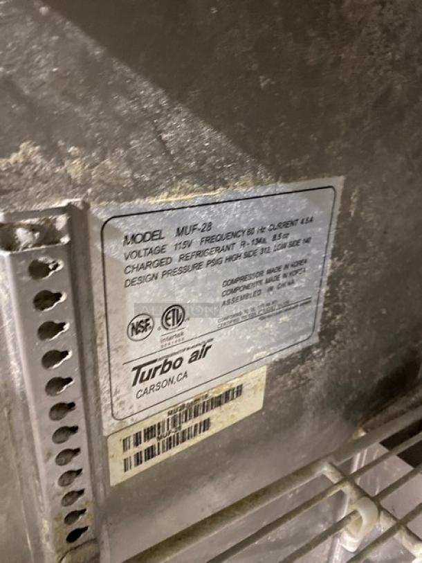 Turbo Air MUF-28 commercial freezer, stainless steel, single door, 115V, on casters, model and specs label visible.