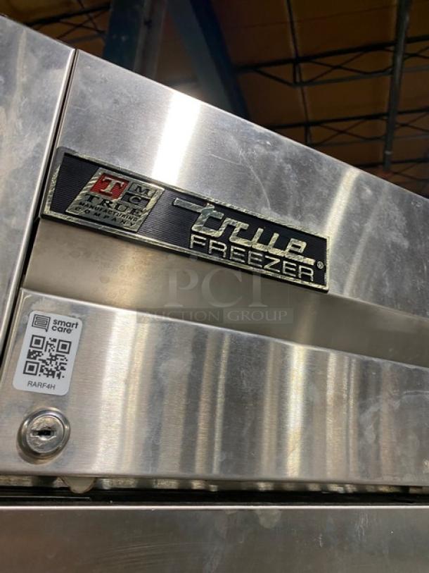 True T-23F stainless steel single door freezer with poly-coated wire rack, 115V, on casters, visible model tag.