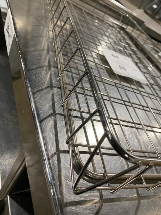 Commercial chrome plated full-sized bagel/pastry wired rack, in excellent condition, featuring sturdy metal construction.