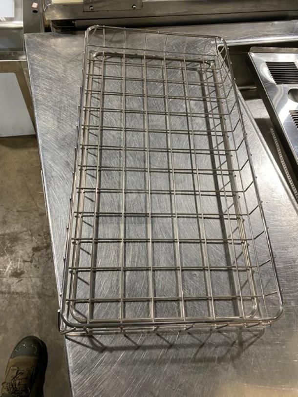 Chrome-plated wire rack for bagels/pastries, full-sized. Excellent condition, steel grid design, suitable for commercial use.