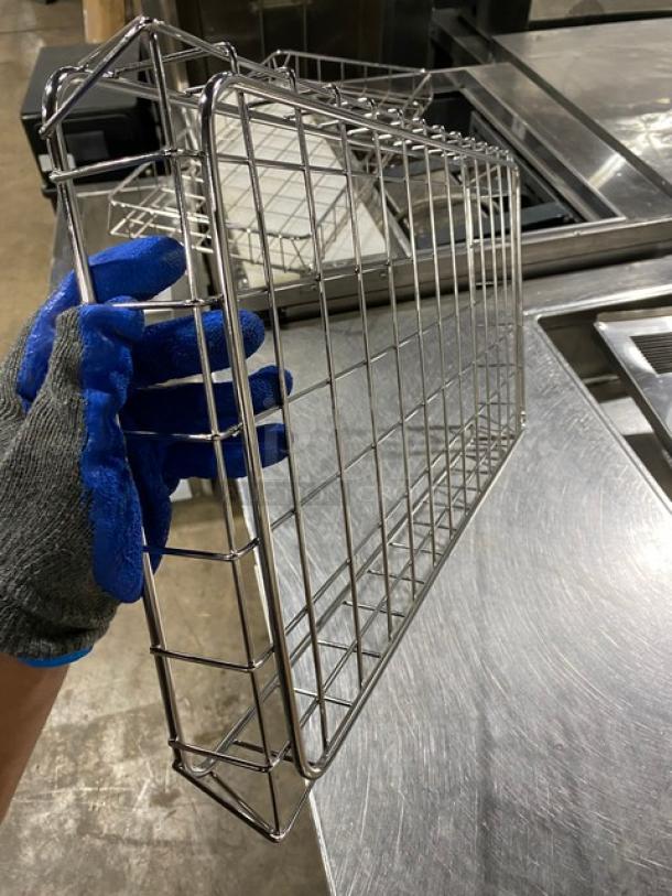 Commercial chrome-plated full-sized bagel/pastry wire rack, excellent condition, grid design, durable for bakery use.