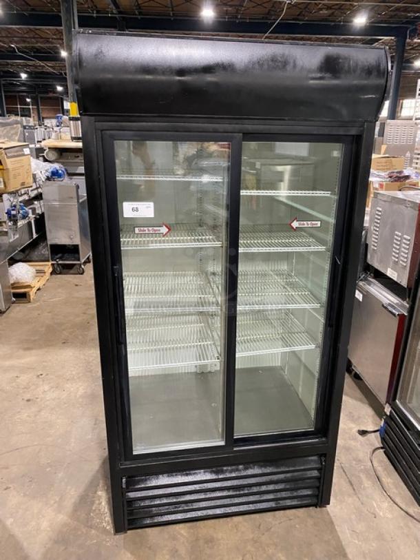 True GDM-33 black commercial refrigerator, double glass sliding doors, poly-coated wire racks, Model: GDM-33, SN: 1-3340720, 115V.