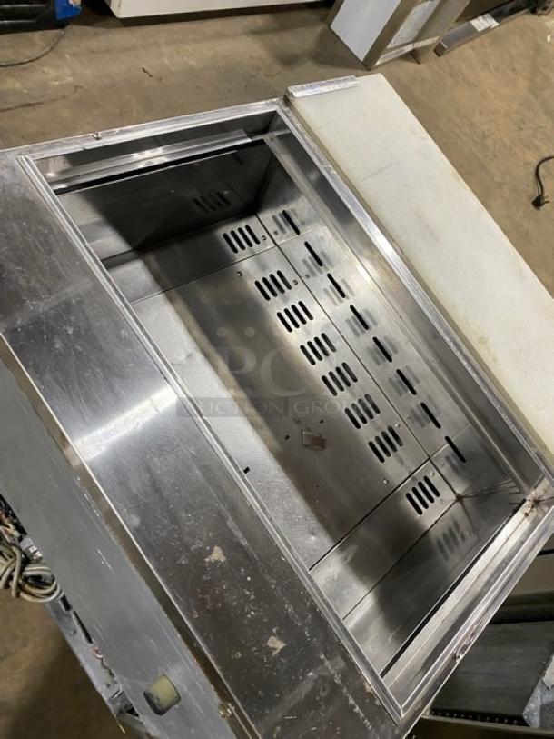 Turbo Air TST-28SD stainless steel refrigerated prep table with cutting board. Commercial use, on casters, 115V.