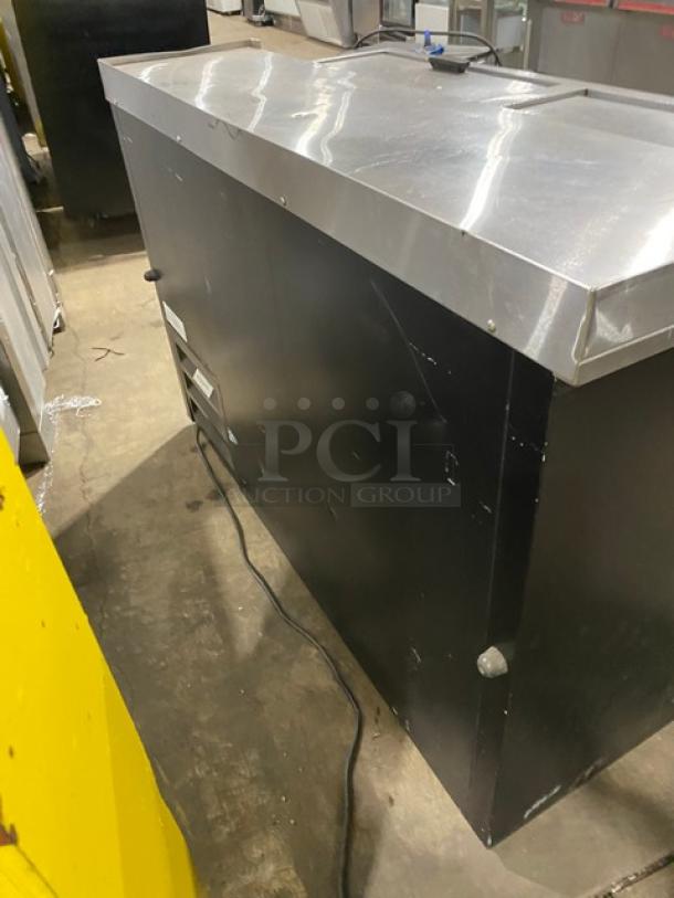 Fogel commercial black double section back bar bottle cooler, Model BC-50DBST, stainless steel top, double sliding lids.
