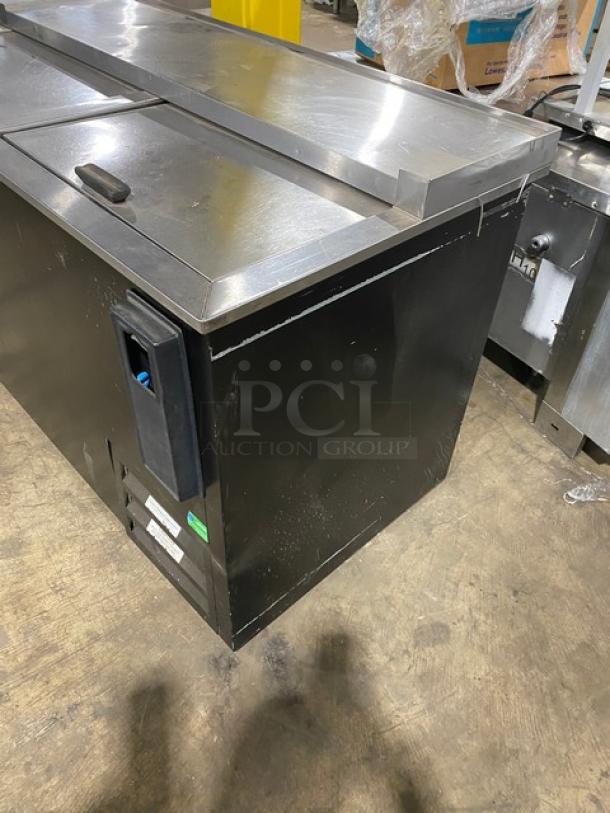 Fogel BC50DBST black powder-coated double section back bar cooler, stainless steel top, double sliding lids, tags visible.