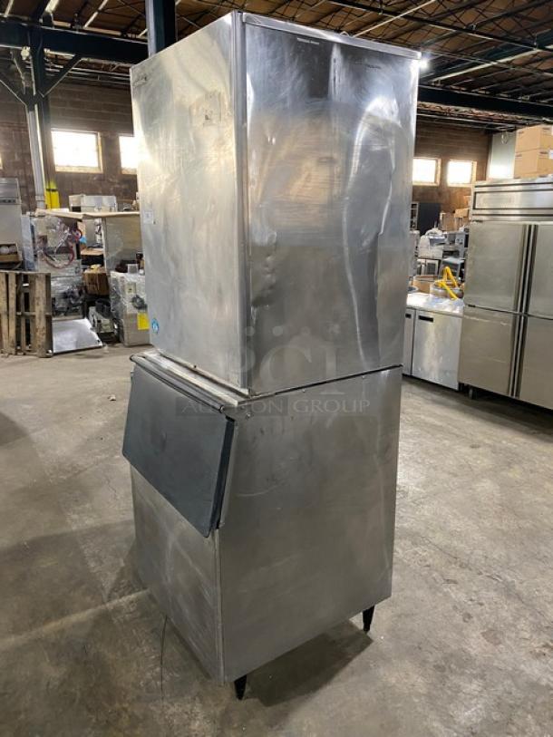 Hoshizaki KM1340MWH stainless steel ice machine with water-cooled top condensing unit, on legs, electric, in used condition.