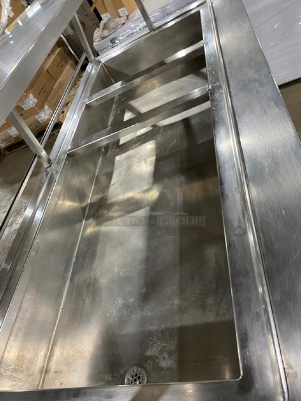 Atlas Metal WH4 stainless steel 4-well hot food/steam table, electric-powered, with sneeze guard, 1-phase, on casters.