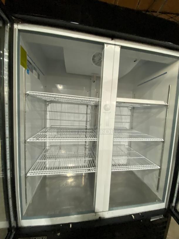 Maxx Cold 2018 black double glass door reach-in merchandiser refrigerator with poly-coated racks, Model MXM2-48R, Energy Star certified.