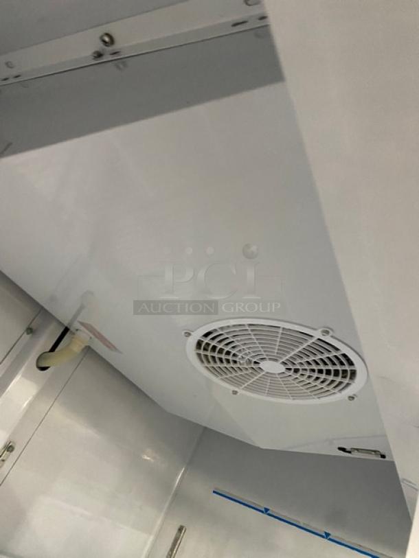 Maxx Cold 2018 commercial refrigerator interior with fan and poly-coated wire racks, Model MXM2-48R, SN 8062835.