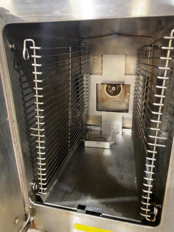Cleveland Range SteamChef 22CGT6.1 stainless steel convection steamer interior with pan holding rack, natural gas powered.