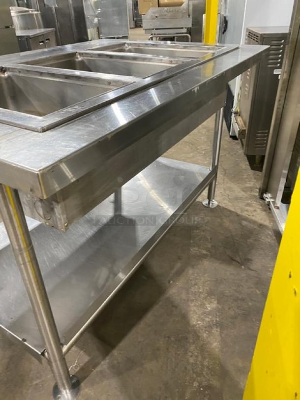 Wells stainless steel electric 3-well hot food steamtable, model MOD300TDM, with undershelf, on legs, 208/240V.