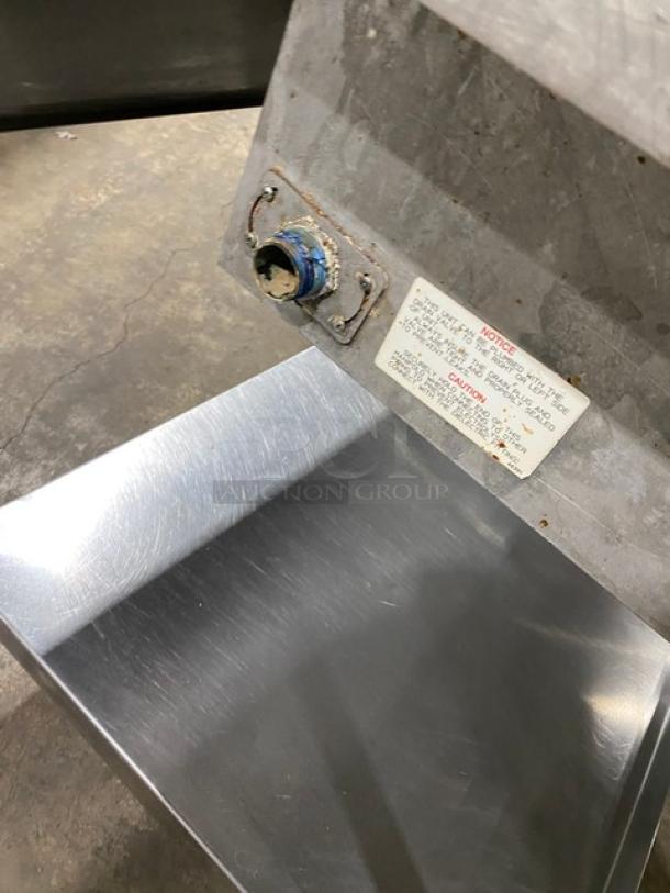 Wells MOD300TDM stainless steel 3-well hot food steamtable, electric, with undershelf and control panel, 208/240V.